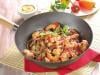 Wok de topinambours, gambas et sauce salsa piquante