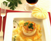 Nids de pommes de terre aux coquilles saint jacques sauce champagne