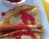 Aumônieres de crêpes et coulis de framboises