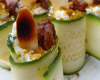 Roulés de courgettes au chèvres, curry et amandes grillés