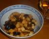 Salade de fruits pommes prunes aromatisee au jus d'oranges et jus de framboises