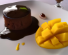 Fondant glacé chocolat-mangue et son coulis de mangue