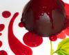 Dôme chocolat tonka, coulis de framboises