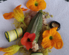 Loup en papillote au corail d'oursin et courgettes fleurs