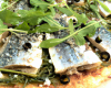 Comme une pizza aux sardines, quelques herbes