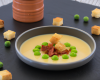 Velouté de petits pois, royale de lard fumé et biscuit croquant au piment d'espelette