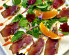 Carpaccio de canard, vinaigrette d'agrume, mesclun de salade au basilic