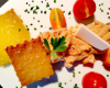 Tuiles de fromage Allegretto, rillettes d'esturgeon et tombée de tomates et de pleurotes