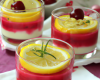 Verrines de crème au citron sur coulis de fruits rouges