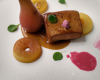 Foie gras poêlé au cacao, sauce au pineau des charentes et gelée d'espelette, poêlée de poires aux fruits confits