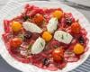 Carpaccio de bœuf, tomates confites, olives noires au Tartare ail et fines herbes