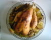 Poulet au four aux herbes sur lit de pommes de terres