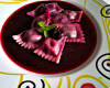 Raviolis à la farce papillonnante  au jus de cerise