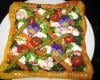 Tarte de fromage frais aux légumes de printemps et pensées