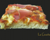 Pizza aux fromages et speck