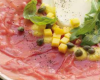 Carpaccio de bœuf et poires en vinaigrette de mangue