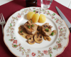 Noisettes de filet de lapereau aux champignons, jus de pommeau aux trois poivres