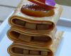 Mille feuilles de crêpes en terrine, compote de pommes à la crème de marron, raisin marinés au rhum et caramel au beurre salé