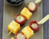 Brochettes de canard emmental grand cru et petits oignons