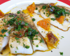 Filets de turbot à l'étouffée, écorces d'oranges et coriandre fraîche