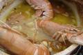 Tajine de joues de lotte aux abricots et langoustines