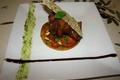 Souris d'agneau confite à la provençale, sur une tarte fine de légumes au pistou