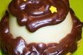 Mes mini délices : mini cheesecake au chocolat blanc citronné sous une pannacotta à l'orange curd, ganache au chocolat noir