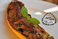 Courgettes gratinées farcies aux chénopodes, amandes, jambon et brousse