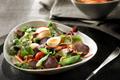Salade de gésiers de canard confits lafitte et pomme fraîche