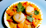 Coquille Saint-Jacques dans sa coquille, huile de curry et carottes fondantes