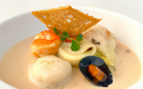 Ravioles de Saint-Jacques et julienne de légumes, bisque de langoustines au foie gras et truffes