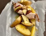 Rôti de porc aux pommes de terre en papillote