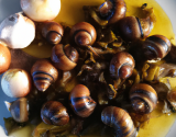 Fricassée d'escargots au cidre et pommes caramélisées