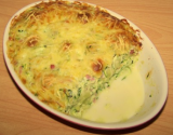 Gratin de ravioles aux lardons et courgettes