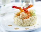 Risotto acidulé, crevettes croustillantes et crème d'étrilles