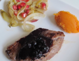 Pavés d'agneau, sauce aux myrtilles, endives braisées avec des grenades et quenelle de patate douce