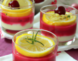 Verrines de crème au citron sur coulis de fruits rouges