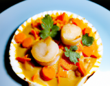 Coquille Saint-Jacques dans sa coquille, huile de curry et carottes fondantes