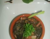 Cassolette d'escargots au vin, lardons,et champignons