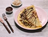 Crêpes à la banane flambée, cacahuètes et chocolat