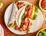 Fajitas au poulet, tomates et poivrons