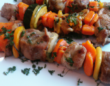 Brochette de veau aux écrevisses et légumes confits