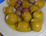 Lieu jaune aux olives