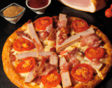 Pizza dinde, jambon, fromages, tomate