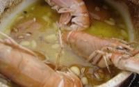 Tajine de joues de lotte aux abricots et langoustines