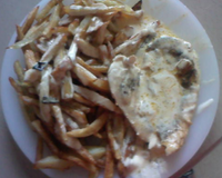 Escalope de dinde sauce à la crème et kub or avec frite c'est trop bon