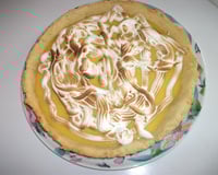 Tarte au citron meringuée sur sa pâte aux zestes