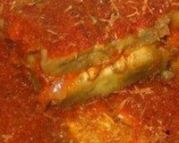 "lasagnes" d'aubergines/tomates/parmesan.aubergines cuites à la vapeur pour éviter de les faire revenir à la poêle comme l'on fait traditionnellement (où elles se gorgent…