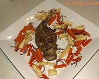 Des cuisses de lapin aux épices douces entourées de légumes rôtis moelleux et croquants.