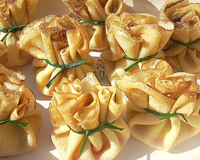 Des oeufs de lompe, un peu de crème fraîche citronnée dans une aumônière de crêpe toute dorée, un succès garanti auprès de vos amis. A servir à l'apéritif ou en entrée…